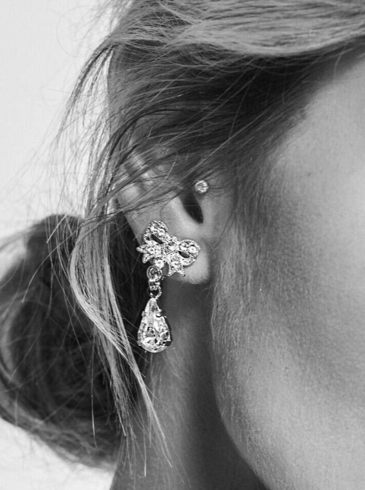 ピアス Crystal Bow Drop Clip-On Earrings Silver-Tone Crystal Bow Drop Clip Earrings | Sandy T.H.