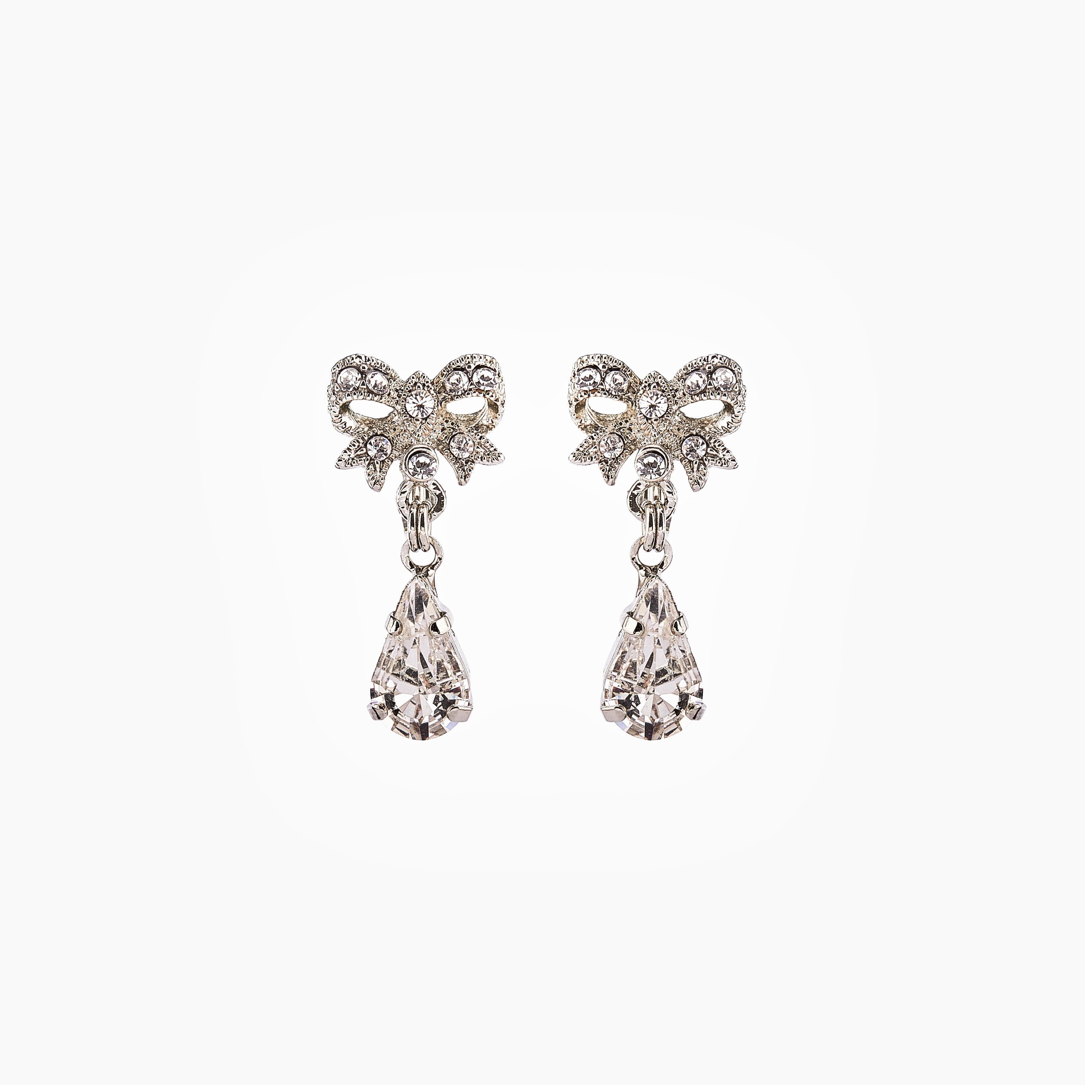 ピアス Crystal Bow Drop Clip-On Earrings Silver-Tone Crystal Bow Drop Clip Earrings | Sandy T.H.